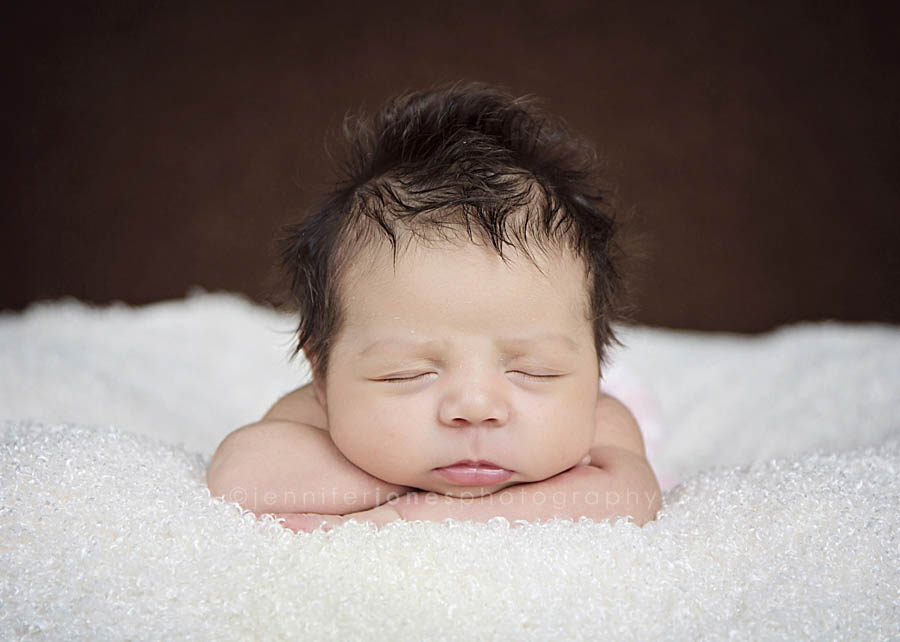 Sweet baby girl sleeps during Arizona newborn photo session