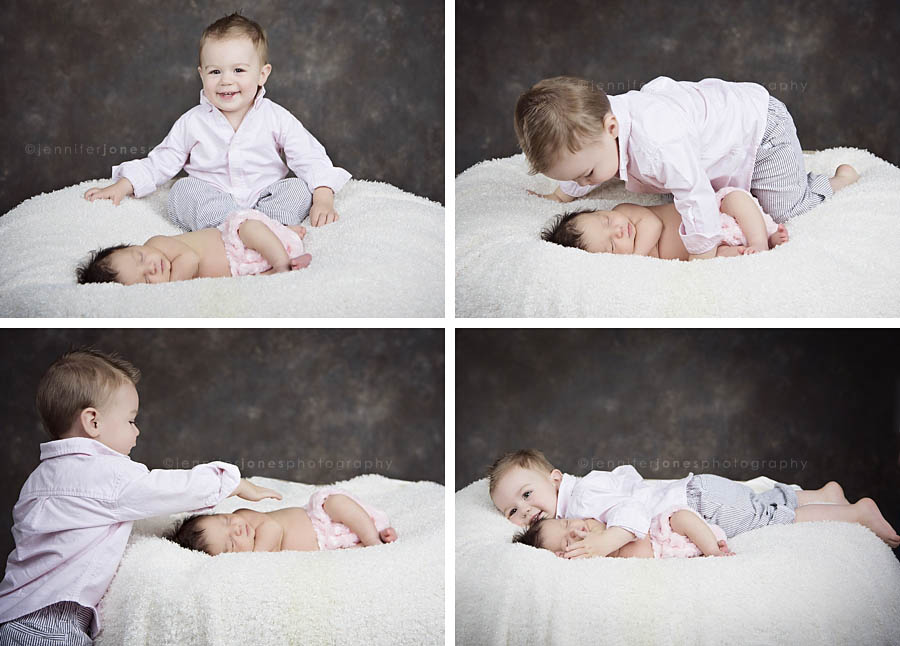 Big brother plays with new sister during Arizona newborn shoot