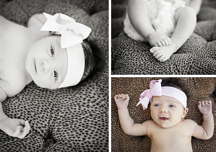 A sweet baby girl smiles during Arizona newborn photo shoot